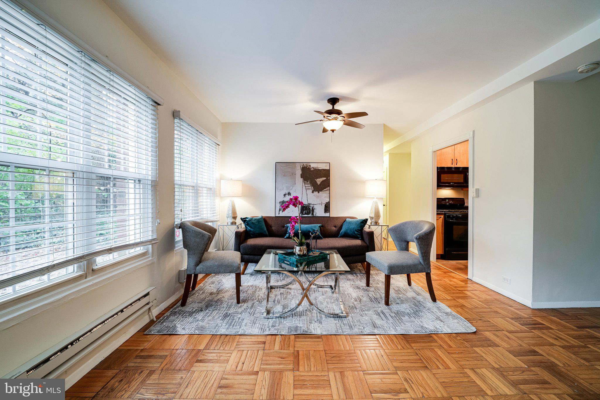 3300 Gunston Road Alexandria, VA 22302 - Photo 9 of 36 LR/DR with tons of natural light and parquet floor