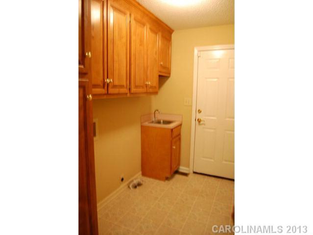 104 Provincial Road Gastonia, NC 28056 - Photo 9 of 12 a bathroom with a sink