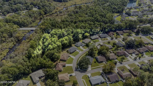an aerial view of residential house with outdoor space