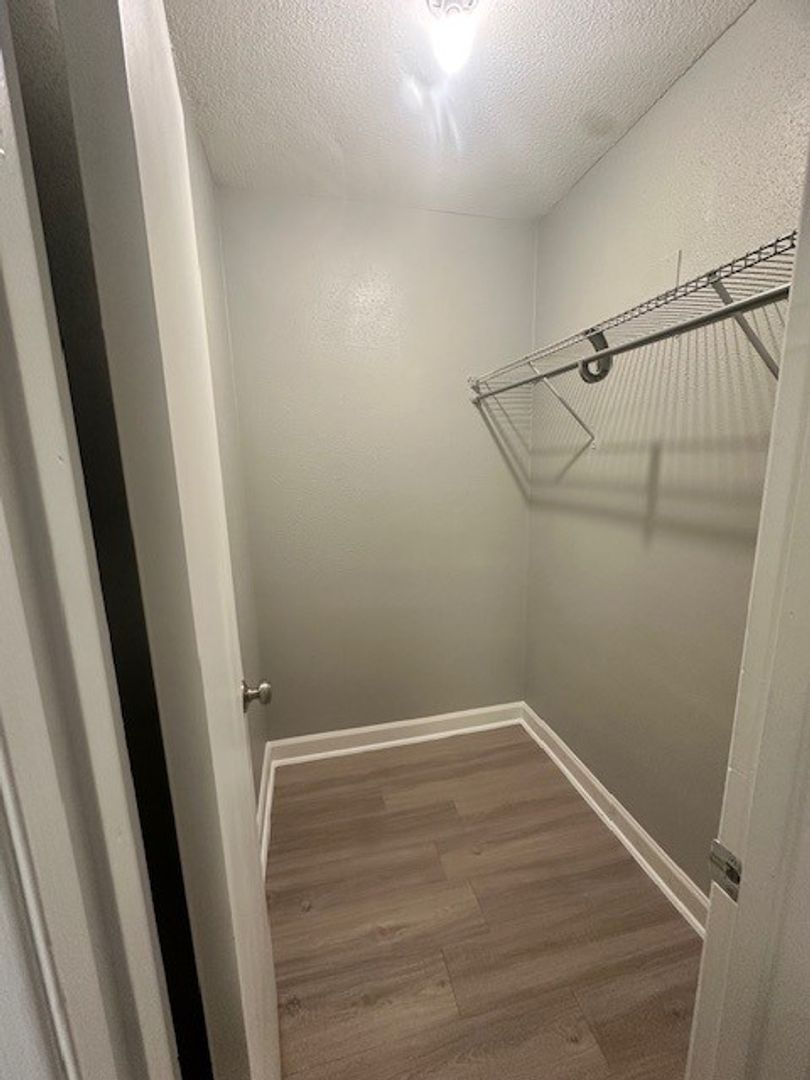 2520 Longview Street, Unit 405 Austin, TX 78705 - Photo 7 of 11 a view of a room with racks on the wall