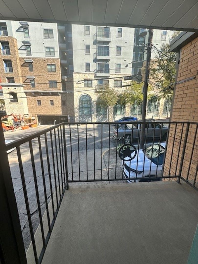 2520 Longview Street, Unit 405 Austin, TX 78705 - Photo 10 of 11 a view of balcony with a swing