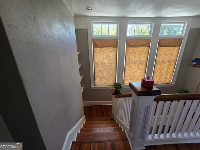 a view of balcony with furniture