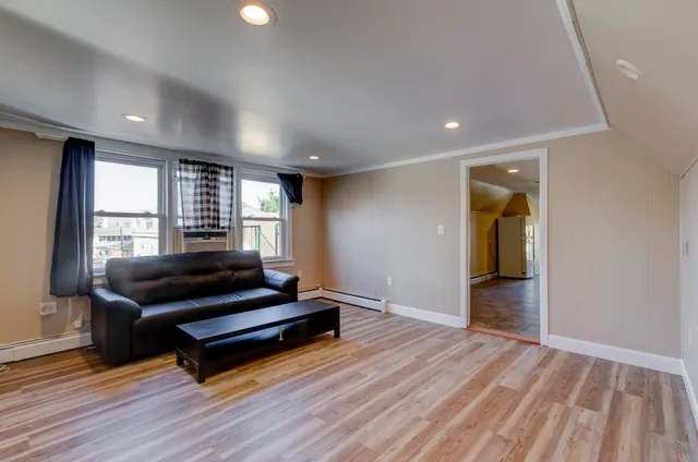 a view of livingroom with furniture and wooden floor