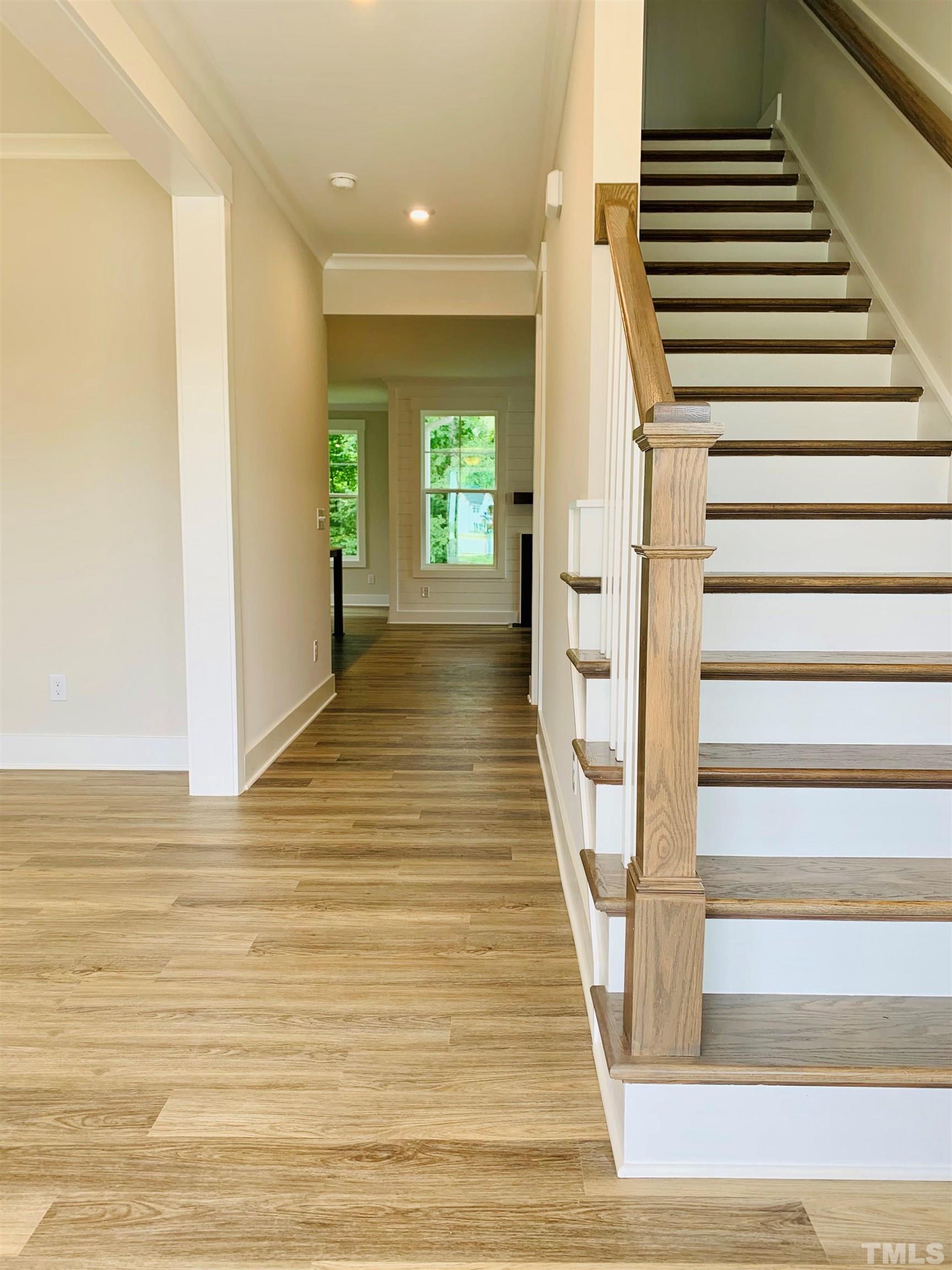 163 DUNLOE Loop Raleigh, NC 27603 - Photo 2 of 32 a view of entryway with wooden floor