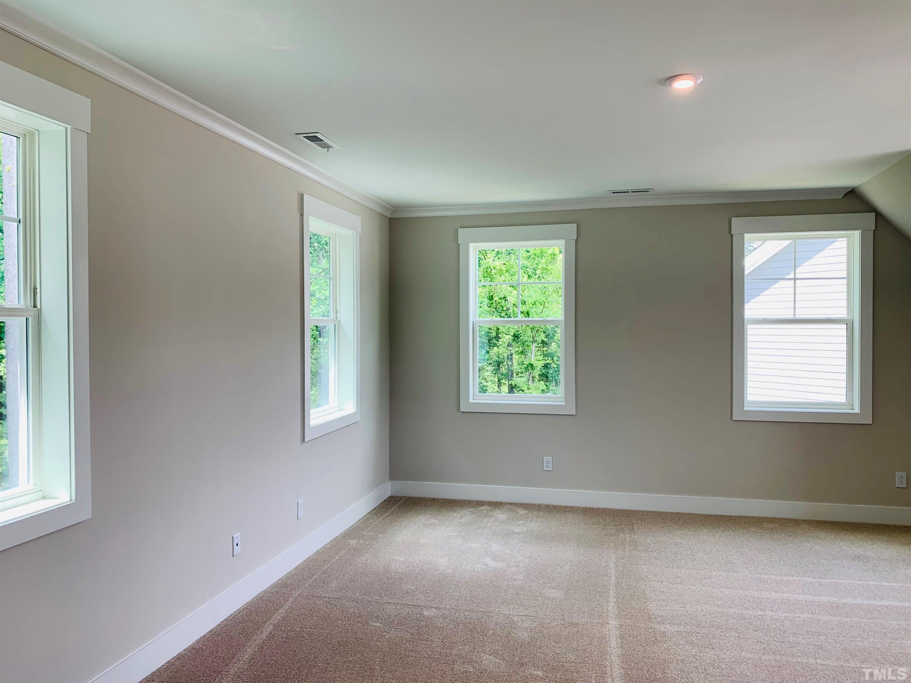 163 DUNLOE Loop Raleigh, NC 27603 - Photo 32 of 32 an empty room with a window