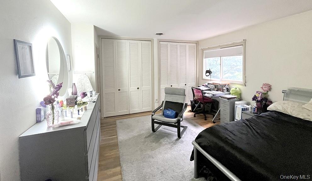 457 Quaker Ridge Road New Rochelle, NY 10804 - Photo 11 of 21 a bed room with a bed and a window