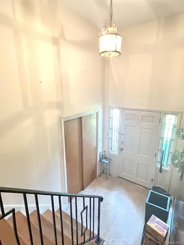 a view of a hallway with windows