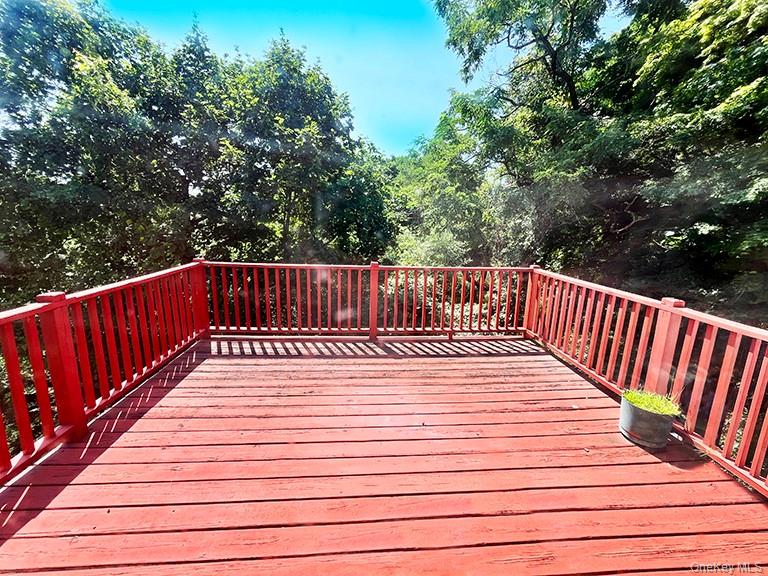 457 Quaker Ridge Road New Rochelle, NY 10804 - Photo 7 of 21 a view of wooden deck