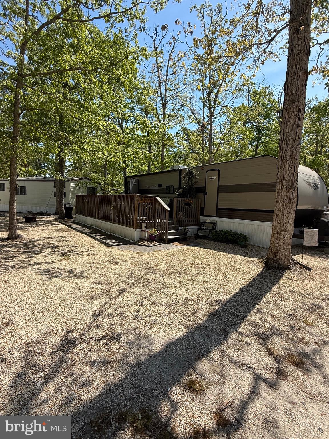 60 Corsons Tavern Road, Unit 342 Ocean View, NJ 08230 - Photo 14 of 19 a view of a backyard of the house