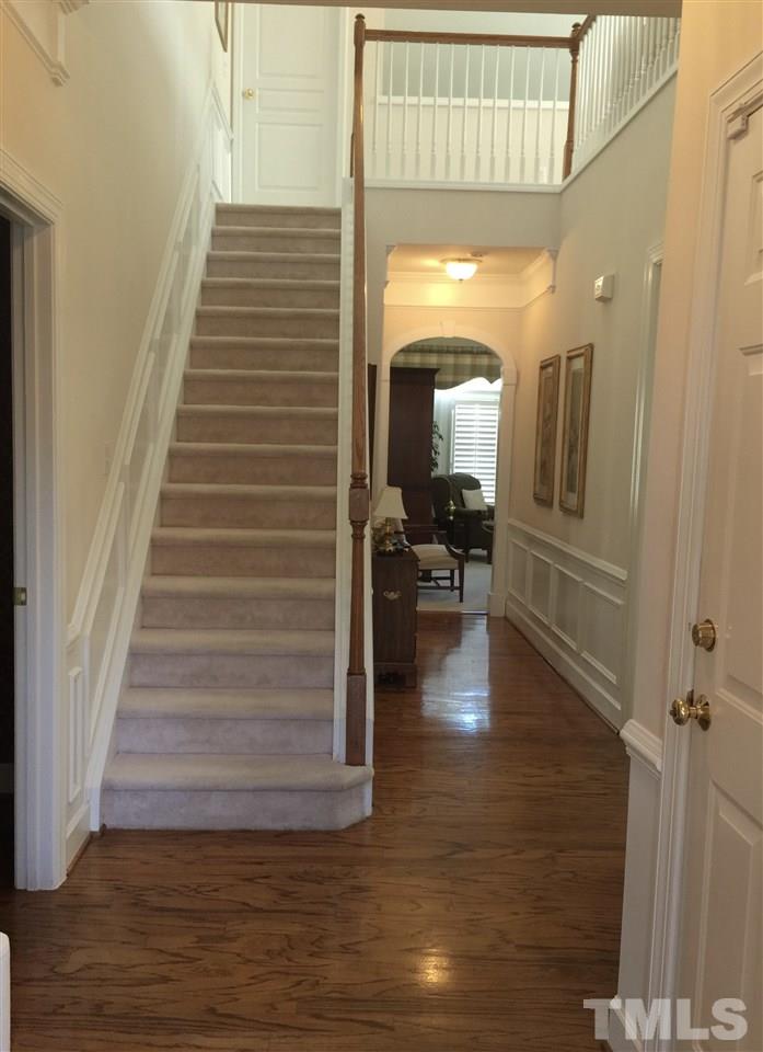 3900 Sunset Maple Court Raleigh, NC 27612 - Photo 12 of 20 Hardwood floors in foyer, dining room, kitchen and 1/2 bathroom.