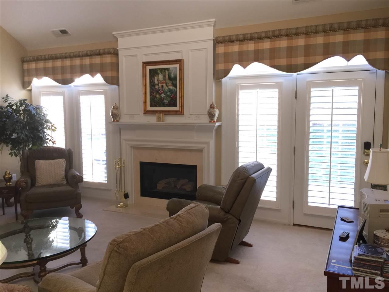 3900 Sunset Maple Court Raleigh, NC 27612 - Photo 7 of 20 French doors open to the private patio