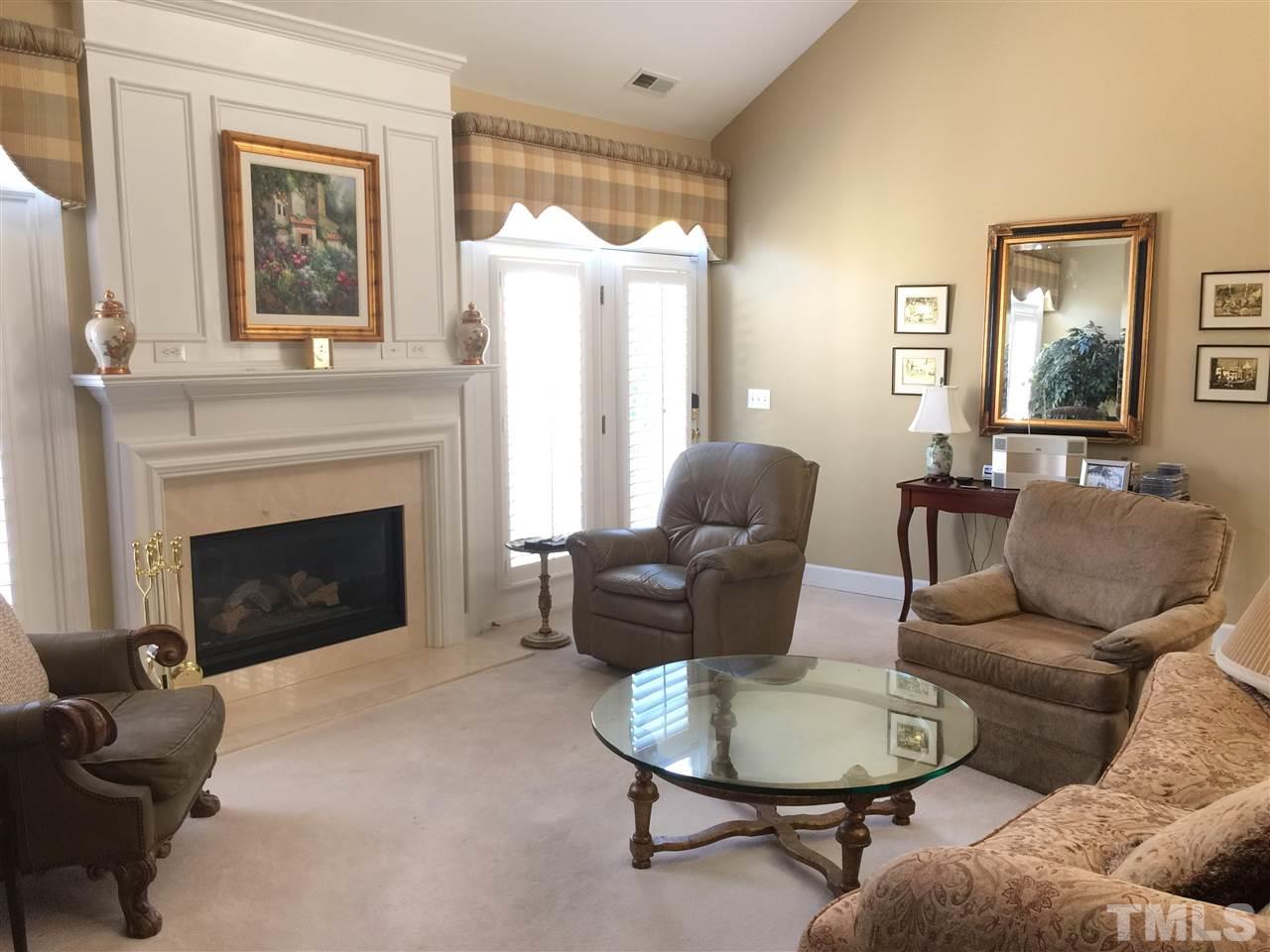 3900 Sunset Maple Court Raleigh, NC 27612 - Photo 8 of 20 Vaulted ceiling opens to second floor family room.