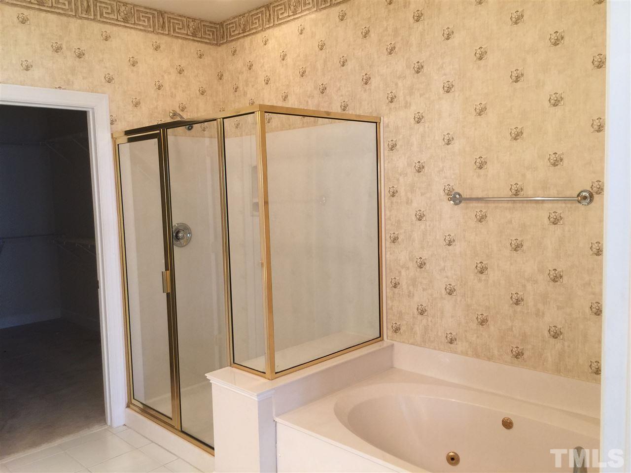 3900 Sunset Maple Court Raleigh, NC 27612 - Photo 10 of 20 Large walk in closet, separate shower, jetted tub and water closet.