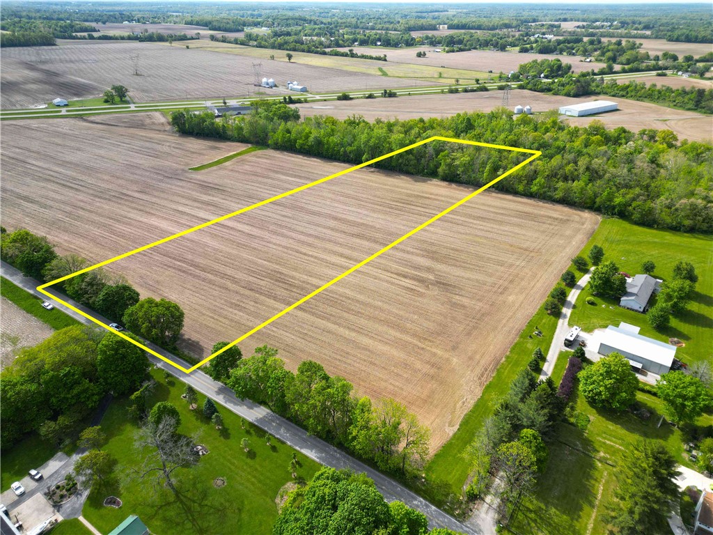 2 Hedges Road Xenia, OH 45385 - Photo 4 of 13 Scenic building lot ready for your custom home, surrounded by open fields and lush greenery.