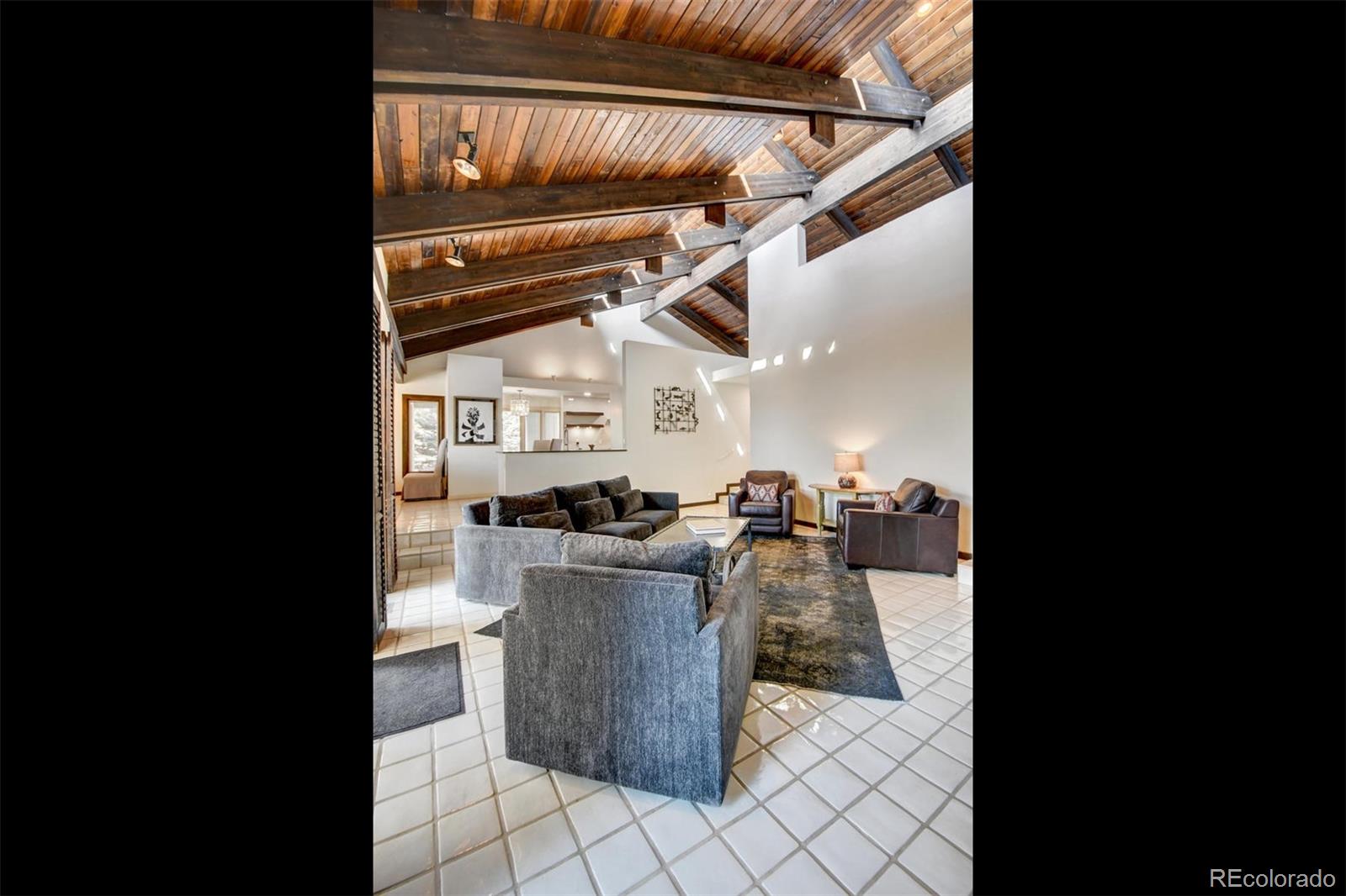 574 Spring Ranch Drive Golden, CO 80401 - Photo 32 of 40 a view of a dining room with furniture