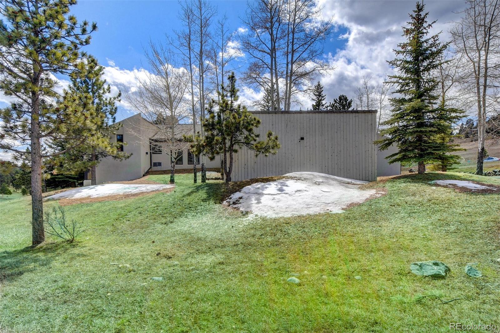 574 Spring Ranch Drive Golden, CO 80401 - Photo 34 of 40 a view of a backyard