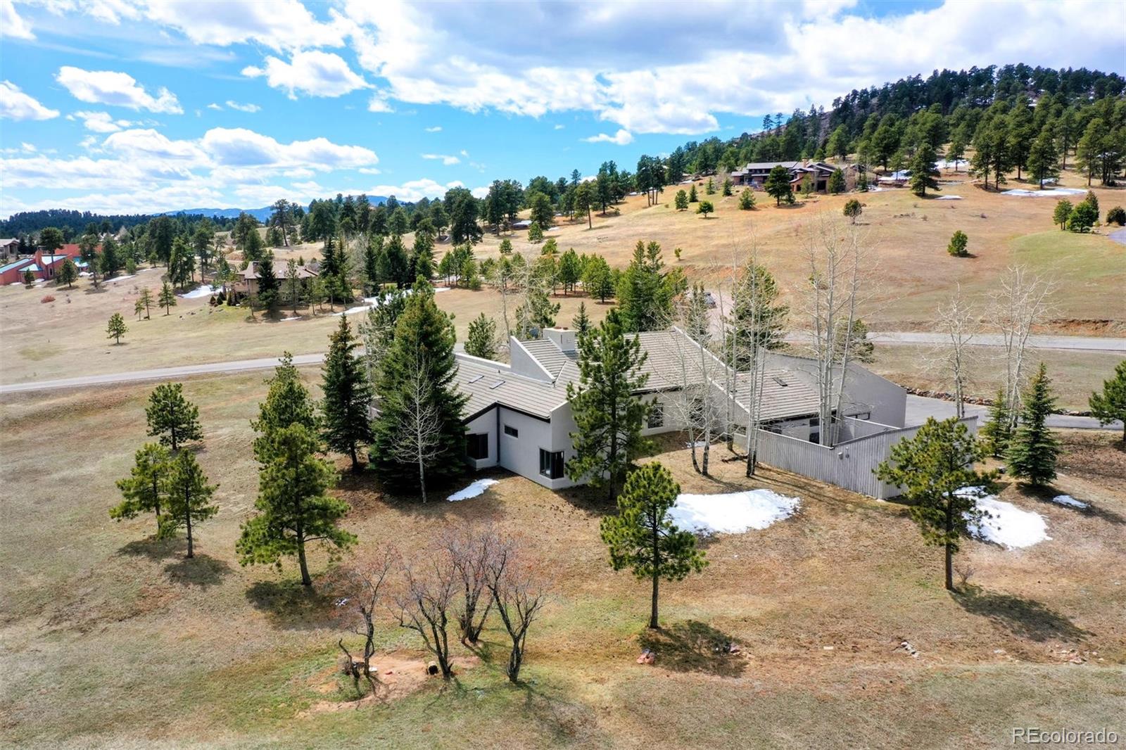 574 Spring Ranch Drive Golden, CO 80401 - Photo 37 of 40 a view of swimming pool and outdoor seating