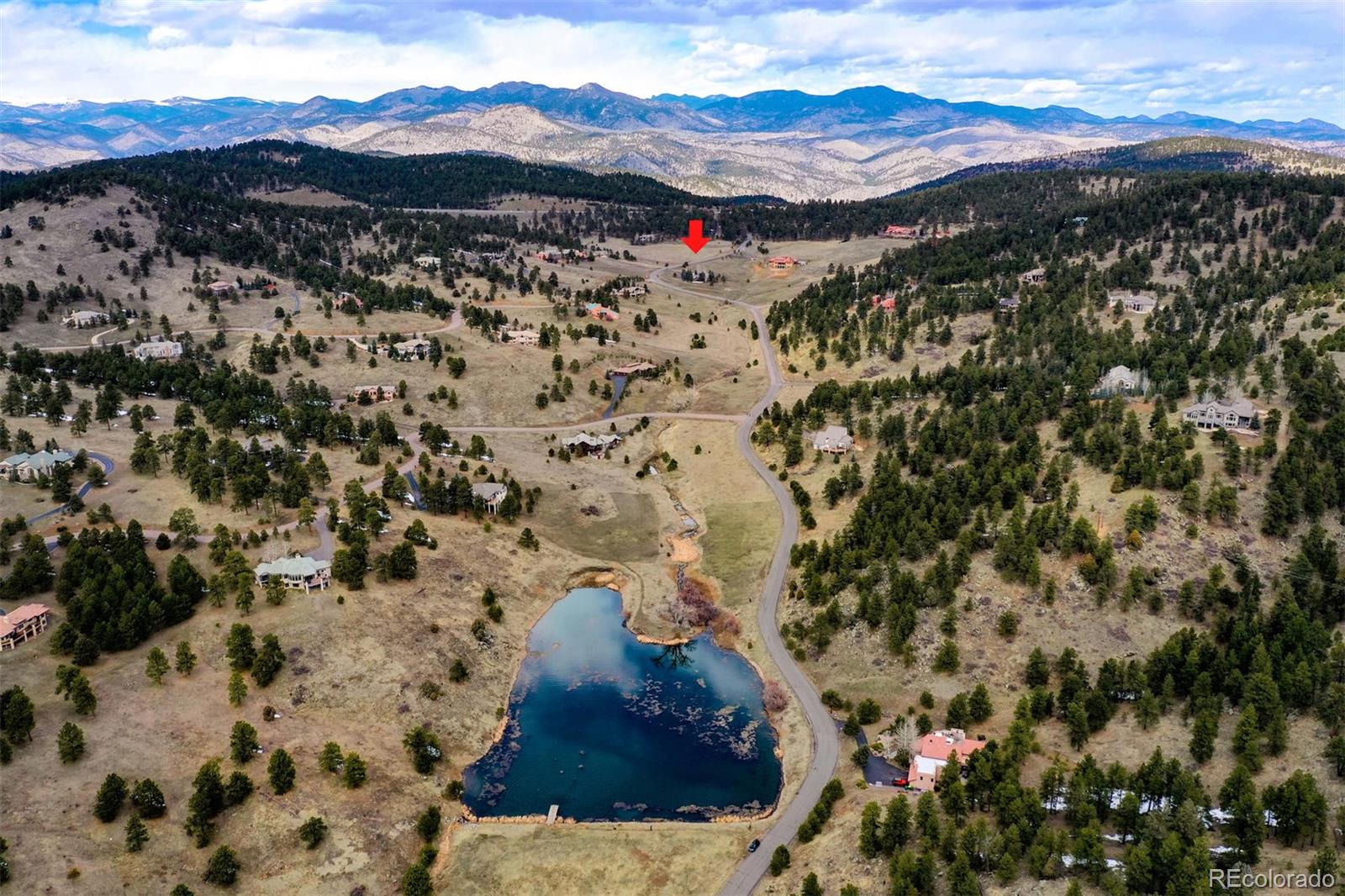 574 Spring Ranch Drive Golden, CO 80401 - Photo 39 of 40 a view of a mountain with a mountain in the background