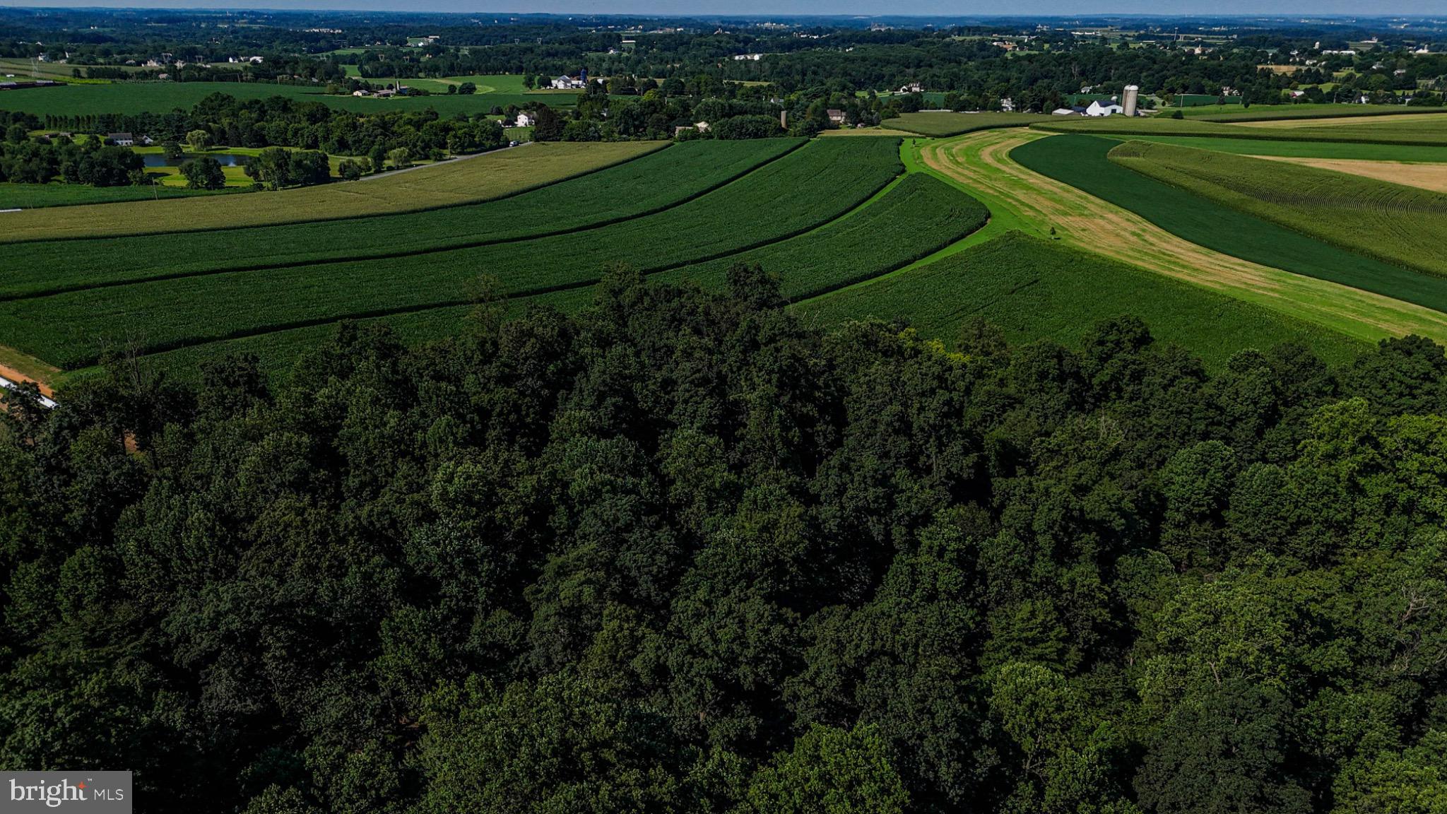 225 Pusey Mill Road Cochranville, PA 19330 - Photo 9 of 21 an aerial view of a golf course with a garden