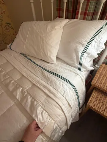 a view of a patio with table and chairs a barbeque