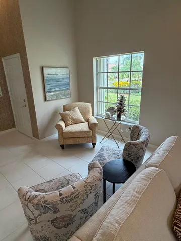a bathroom with a toilet mirror and sink
