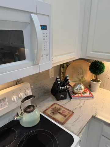 a bathroom with a shower and a toilet