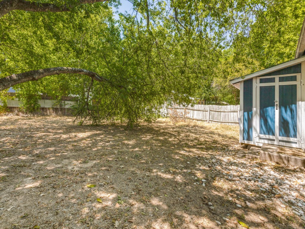1136 Garland Avenue Austin, TX 78721 - Photo 22 of 24 a view of a house with a tree
