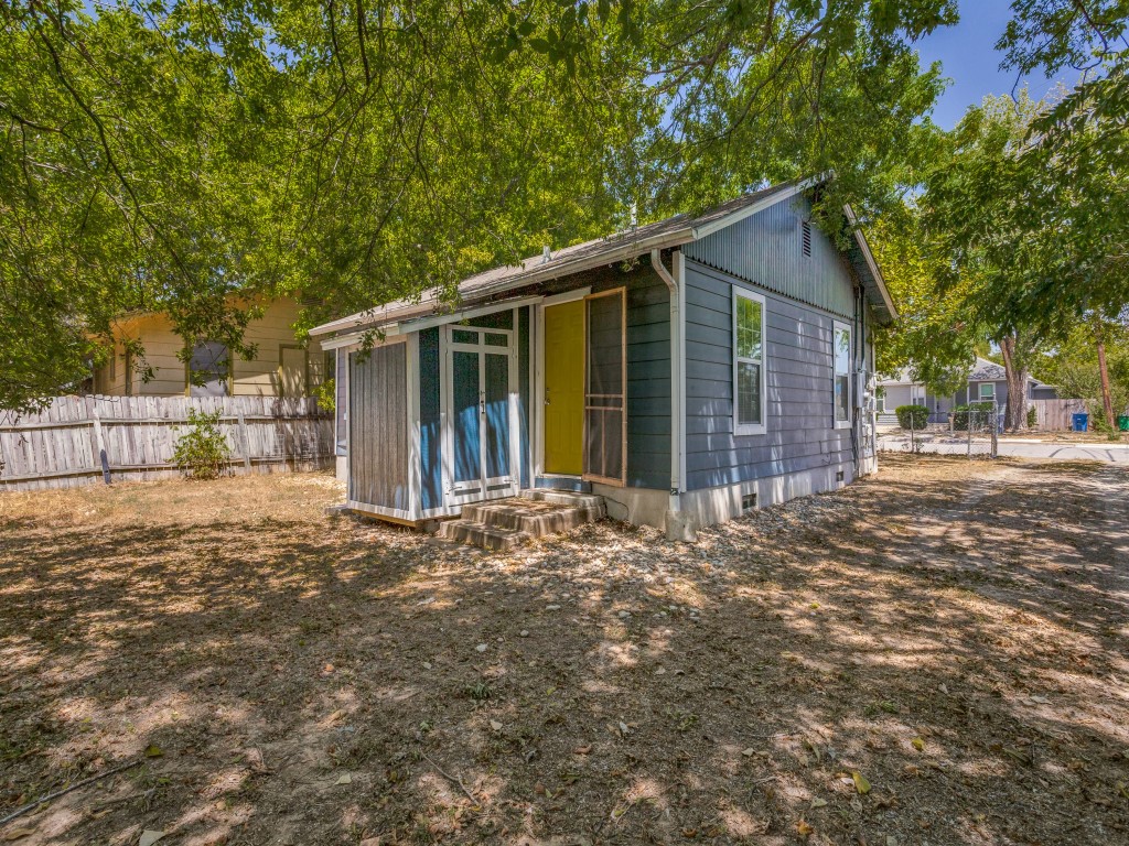 1136 Garland Avenue Austin, TX 78721 - Photo 24 of 24 a view of a house with a yard