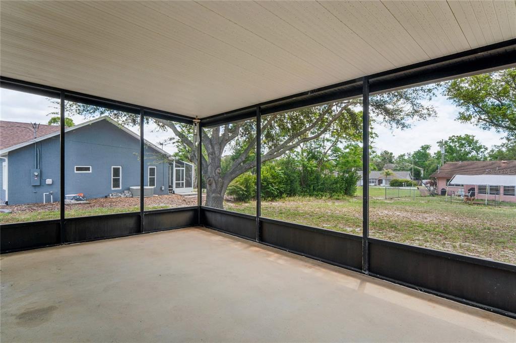 10194 Gamewell Street Spring Hill, FL 34608 - Photo 25 of 36 a view of a room with window and a balcony