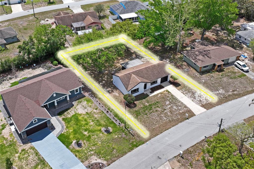 10194 Gamewell Street Spring Hill, FL 34608 - Photo 33 of 36 an aerial view of a house