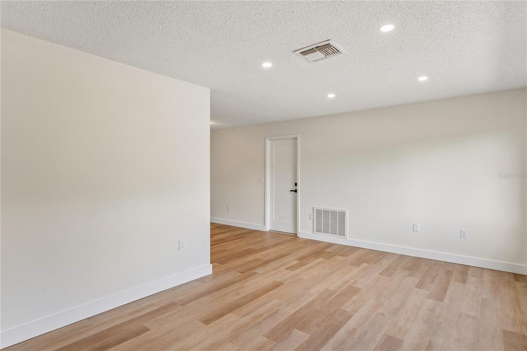 10194 Gamewell Street Spring Hill, FL 34608 - Photo 5 of 36 a view of an empty room