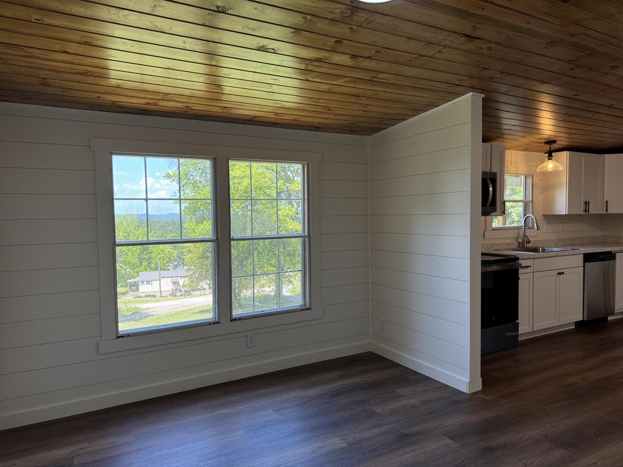 675 Ware Lane Georgetown, TN 37336 - Photo 15 of 24 a kitchen with a wooden floor and a window