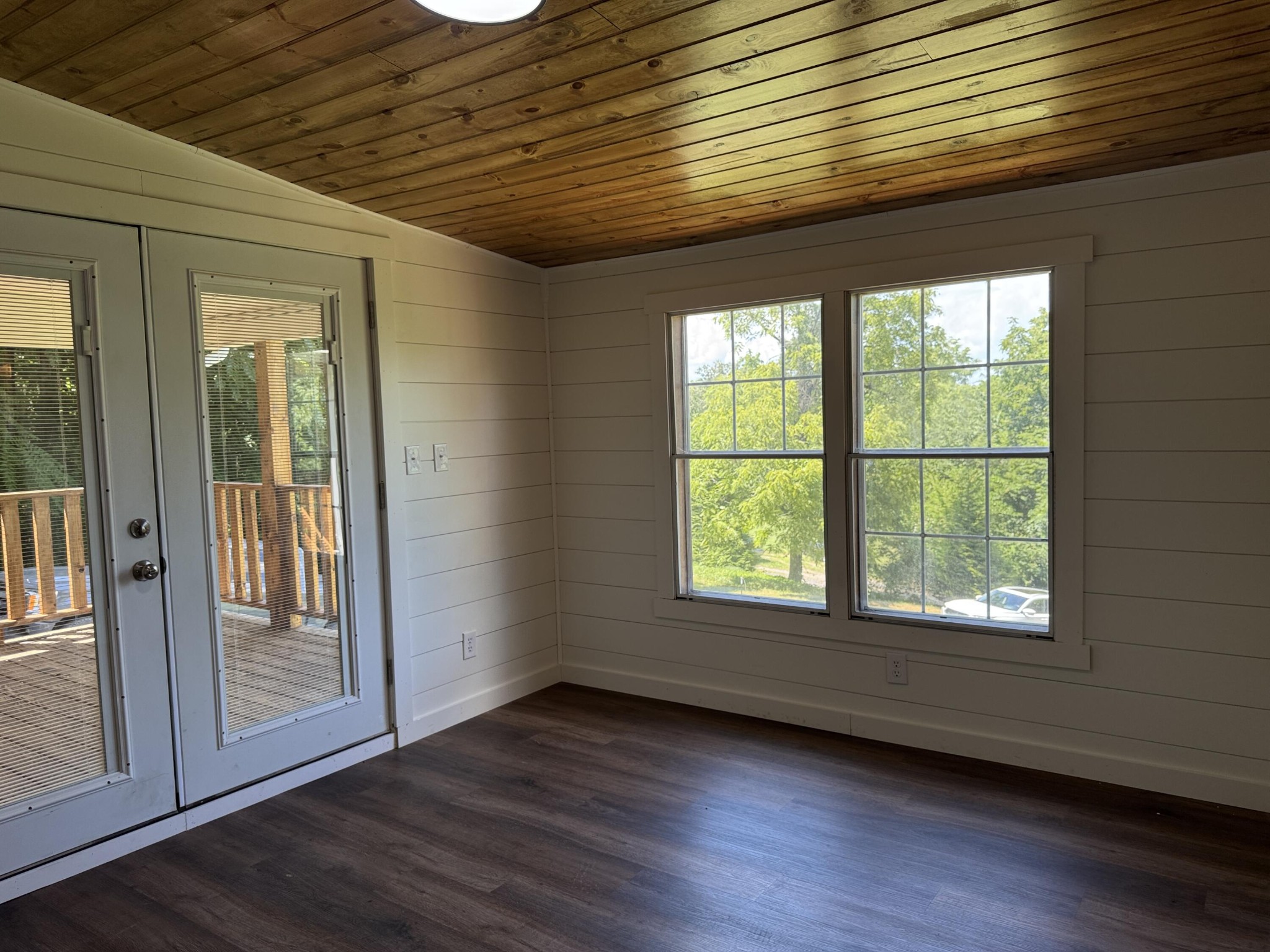 675 Ware Lane Georgetown, TN 37336 - Photo 16 of 24 a view of an empty room with wooden floor and a window