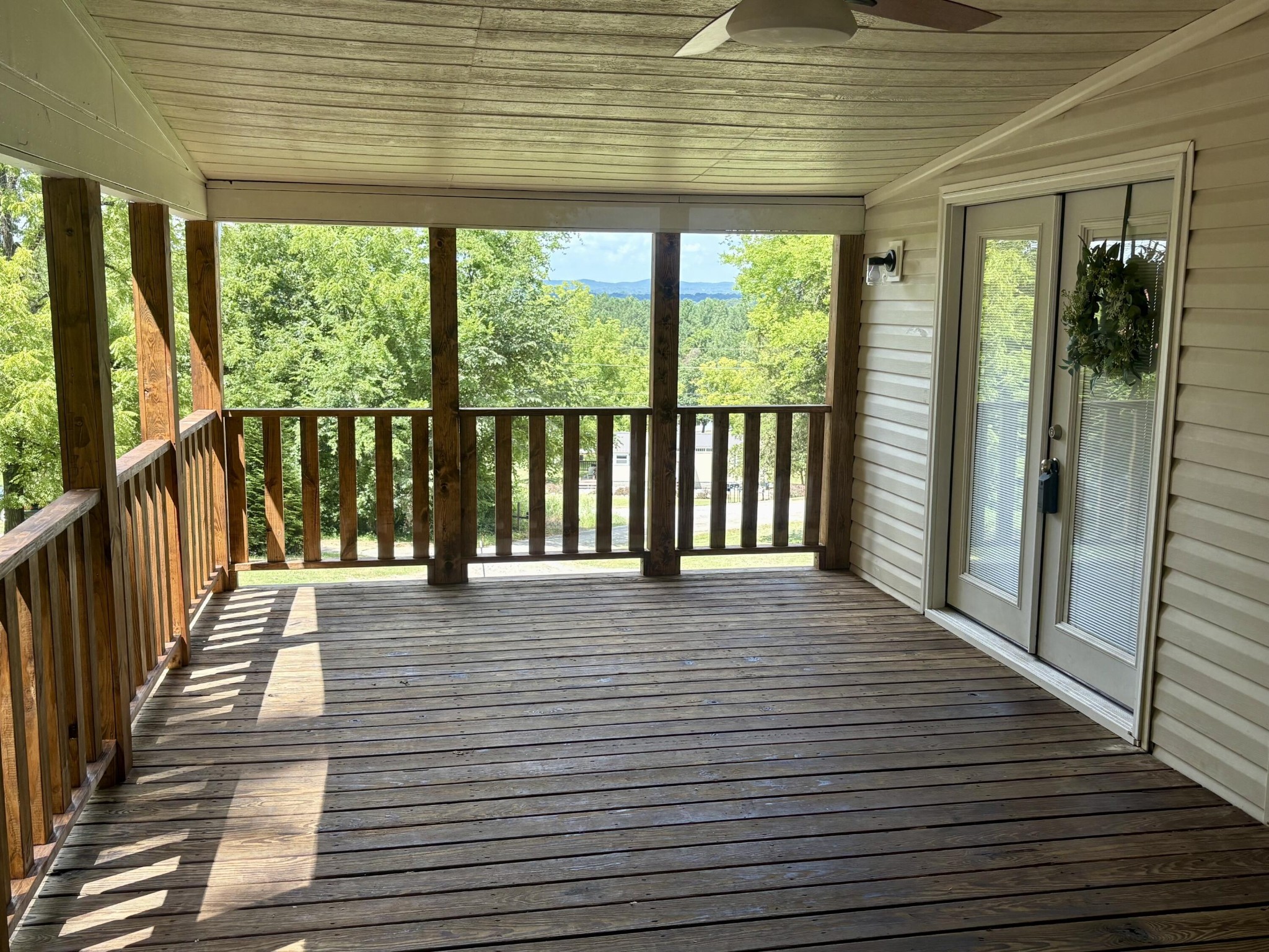 675 Ware Lane Georgetown, TN 37336 - Photo 17 of 24 a view of a balcony with wooden floor