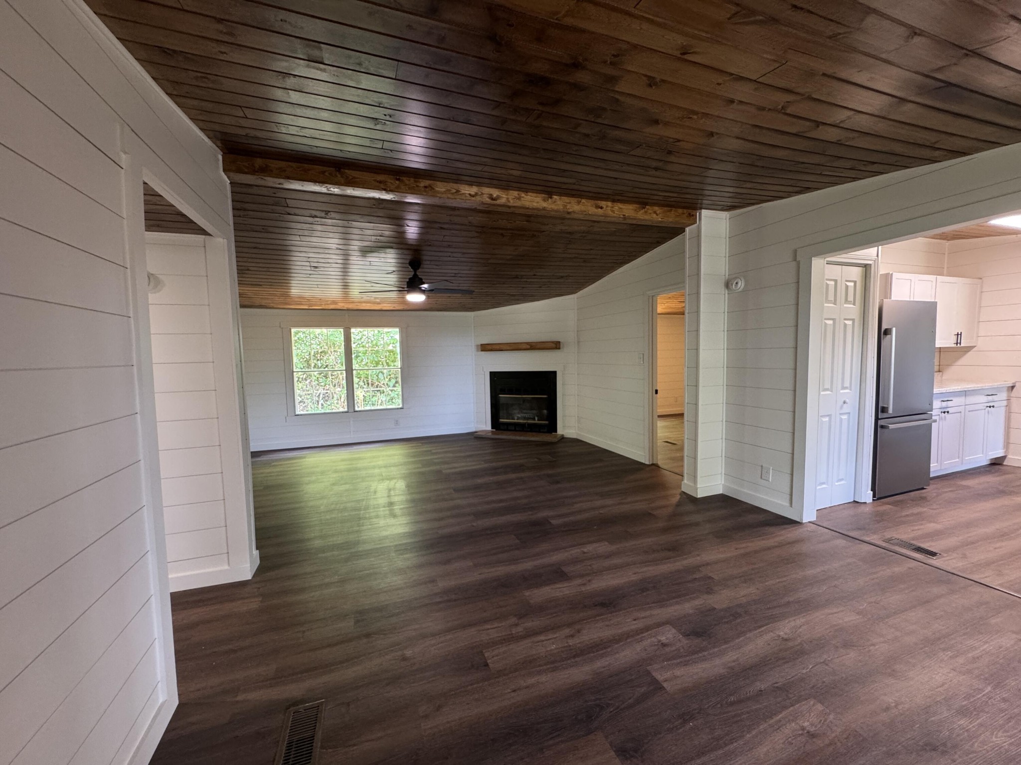 675 Ware Lane Georgetown, TN 37336 - Photo 19 of 24 a view of empty room with wooden floor and fireplace