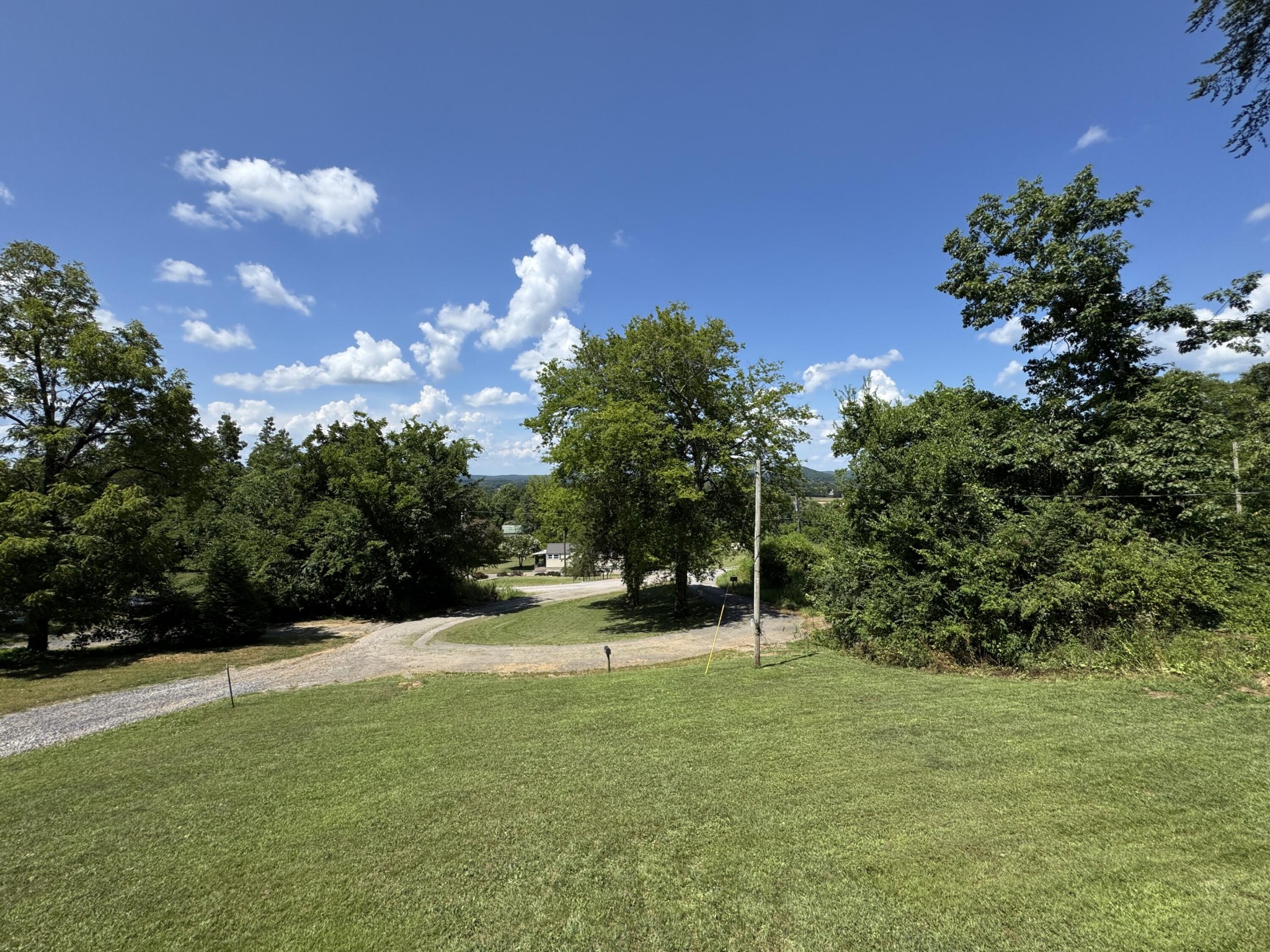 675 Ware Lane Georgetown, TN 37336 - Photo 2 of 24 a view of outdoor space with green field and trees