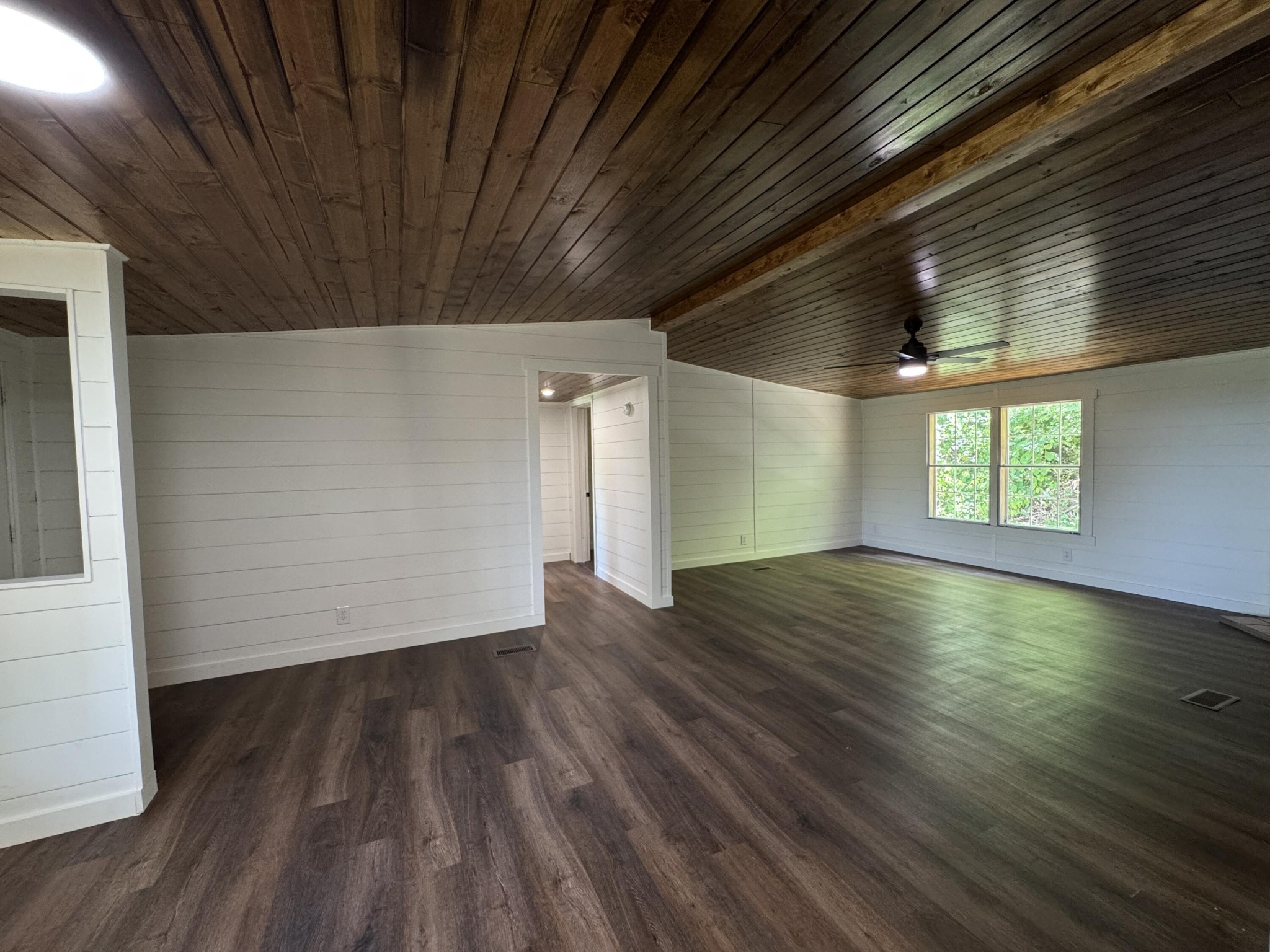 675 Ware Lane Georgetown, TN 37336 - Photo 3 of 24 an empty room with wooden floor and windows