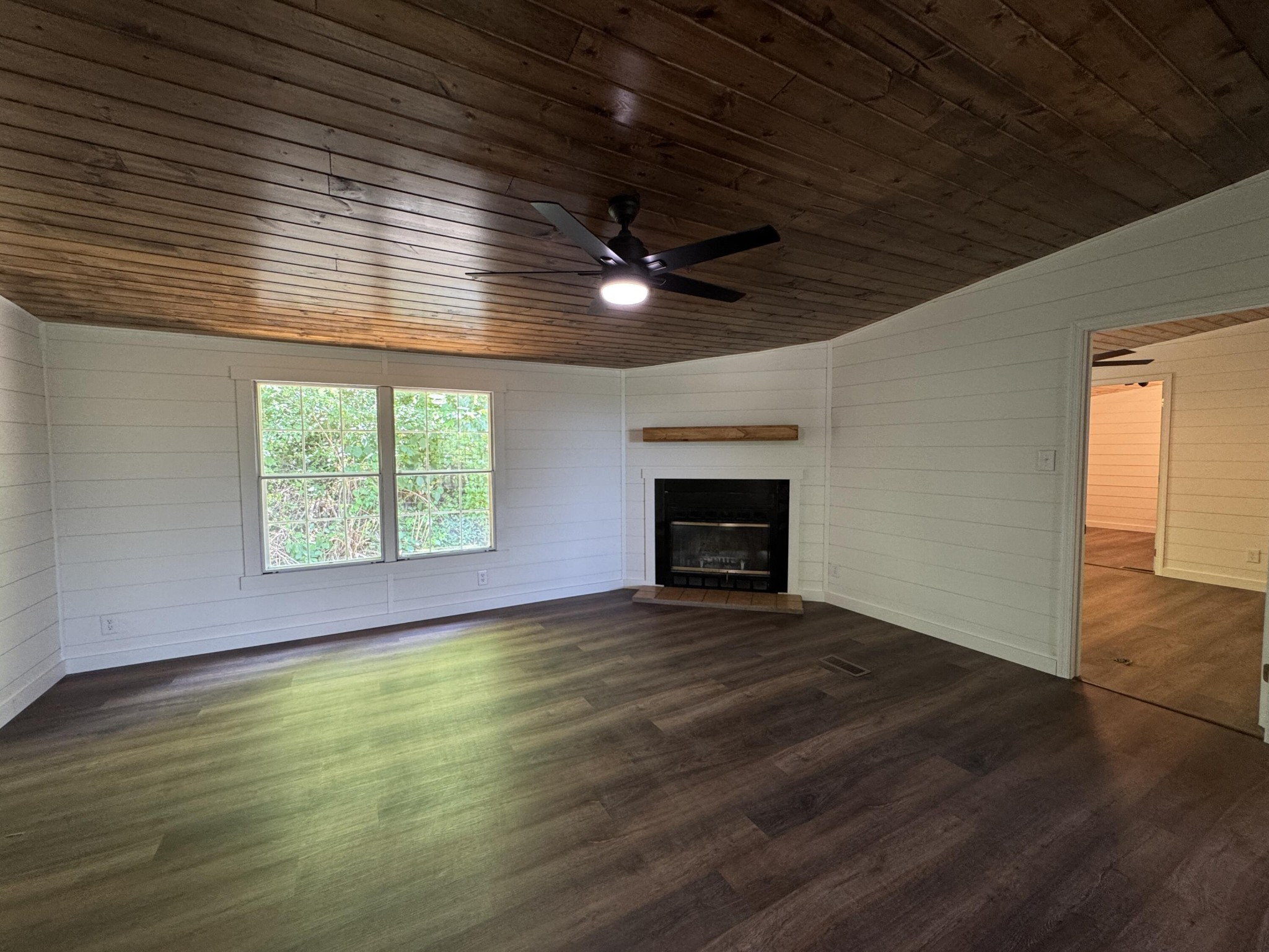 675 Ware Lane Georgetown, TN 37336 - Photo 4 of 24 an empty room with windows and fireplace