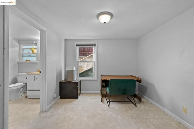 a workspace with furniture and window