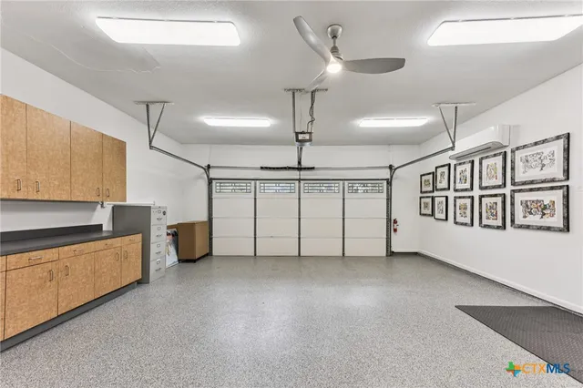 a view of a kitchen with furniture and a window