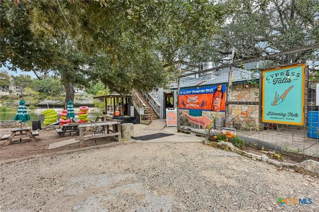 a view of a lake with a bench and lake view