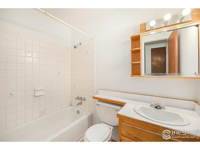 a bathroom with a sink toilet a bathtub and a shower