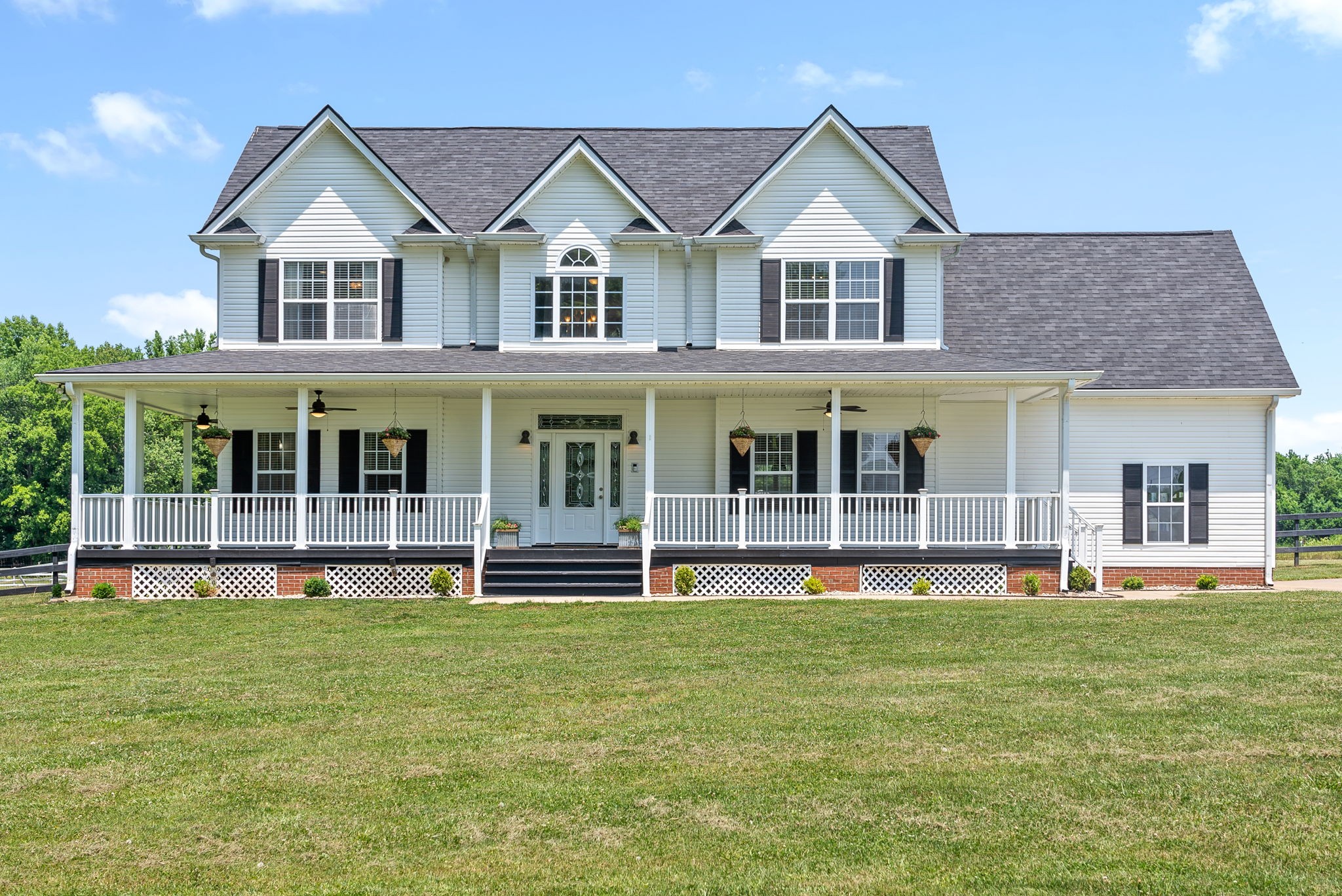 4555 Pineywoods Road Adams, TN 37010 - Photo 1 of 55 a front view of a house with a yard