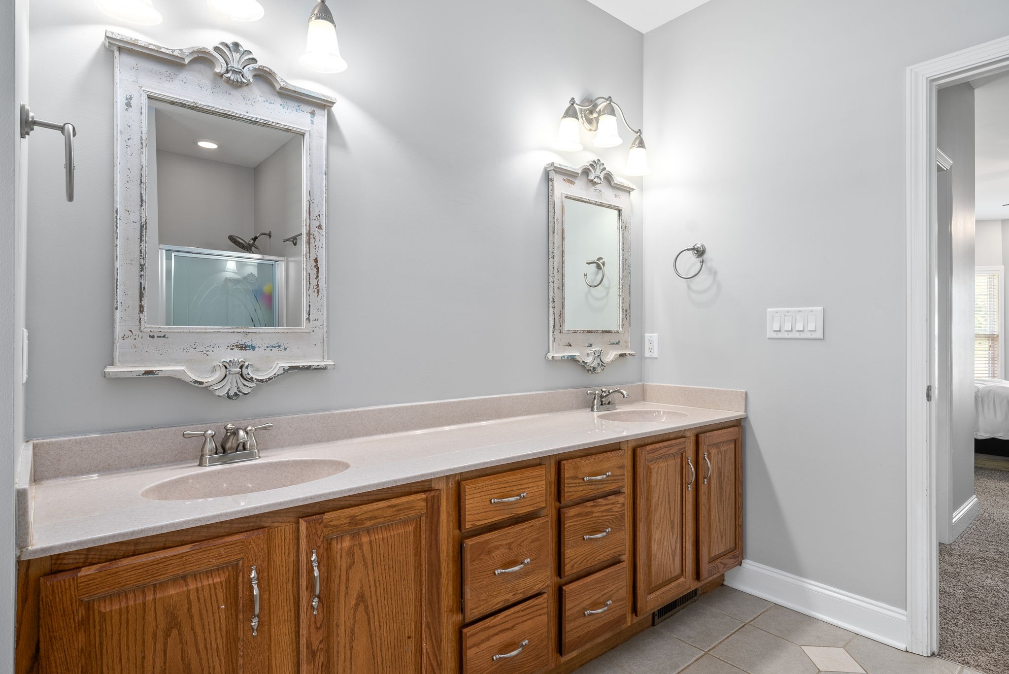 4555 Pineywoods Road Adams, TN 37010 - Photo 25 of 55 a bathroom with a double vanity sink and a mirror