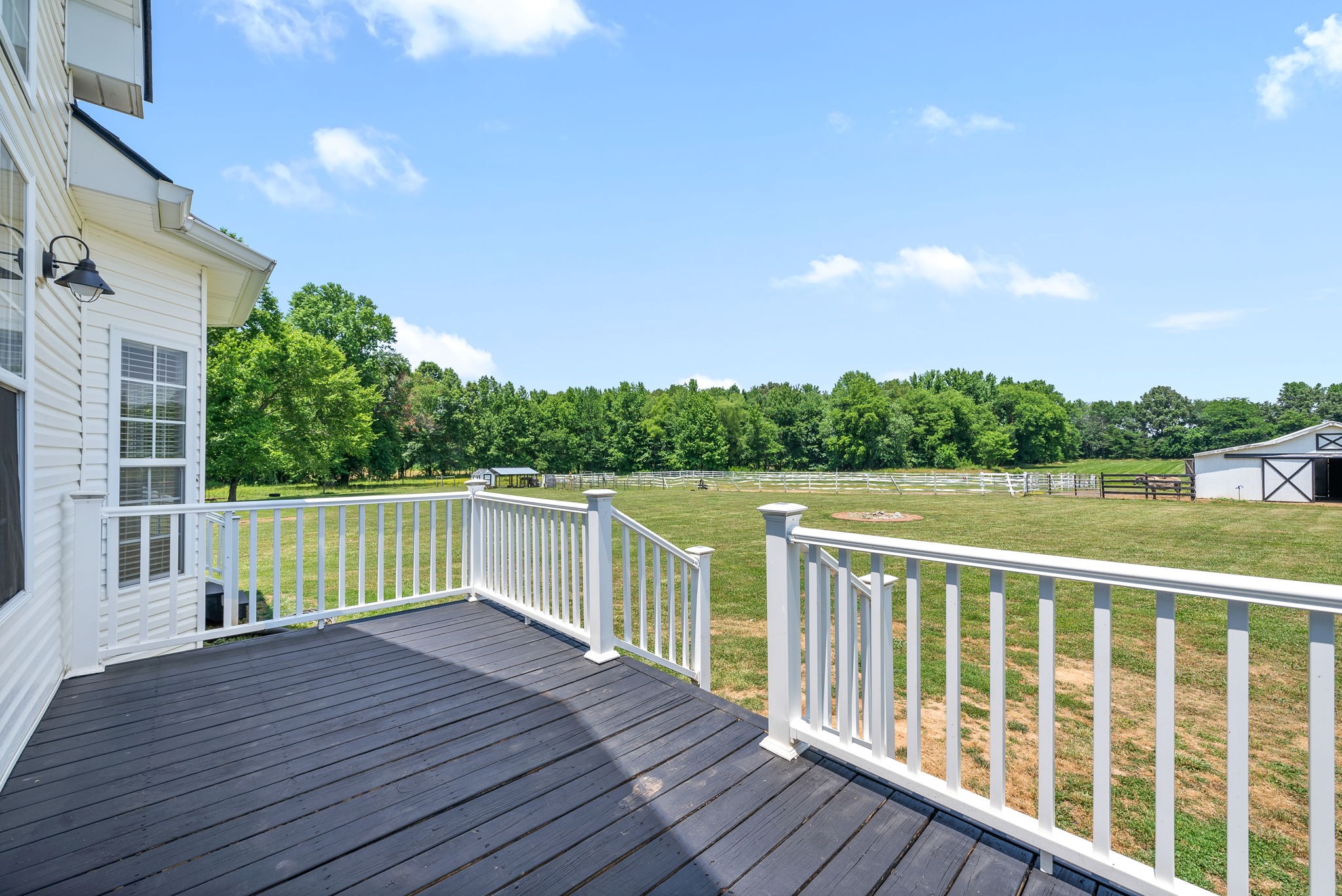 4555 Pineywoods Road Adams, TN 37010 - Photo 34 of 55 a balcony with wooden floor and fence