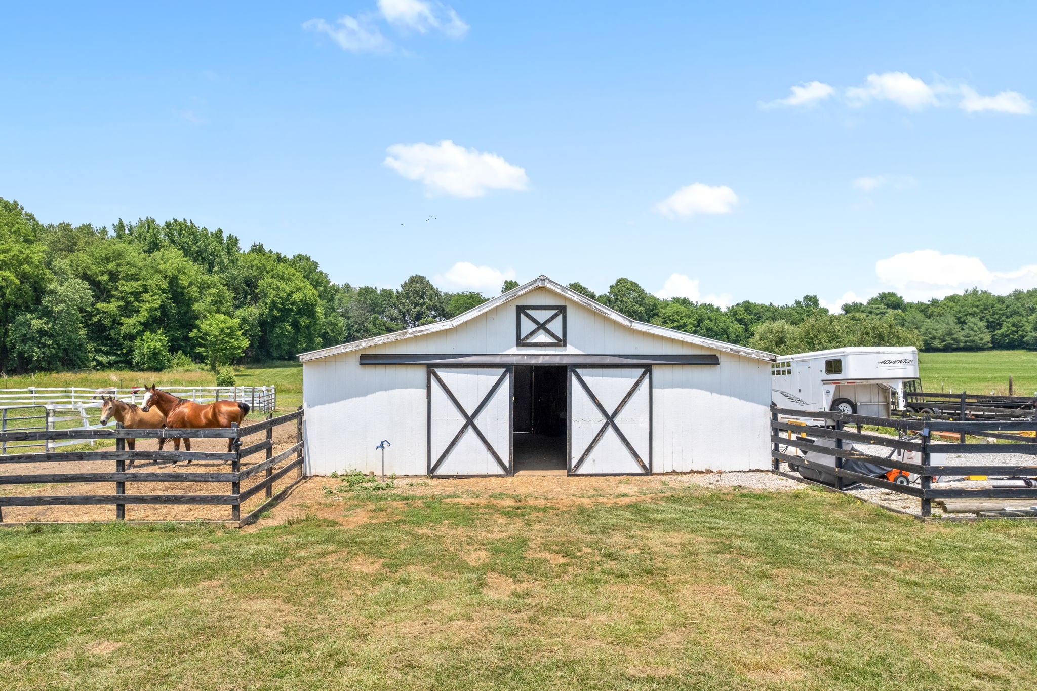 4555 Pineywoods Road Adams, TN 37010 - Photo 41 of 55 a view of a house with a yard and sitting area