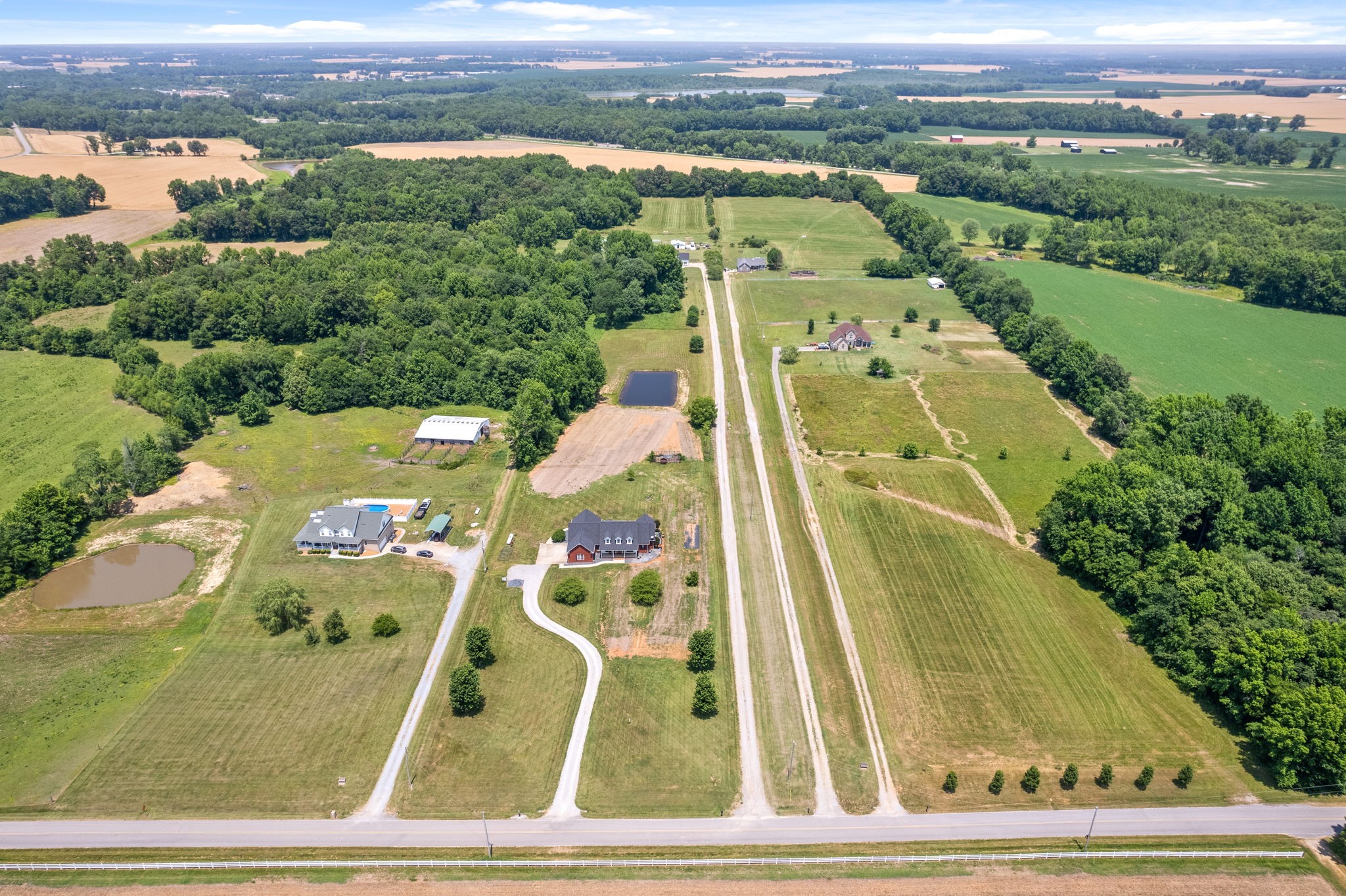 4555 Pineywoods Road Adams, TN 37010 - Photo 44 of 55 an aerial view of a residential houses with outdoor space and street view