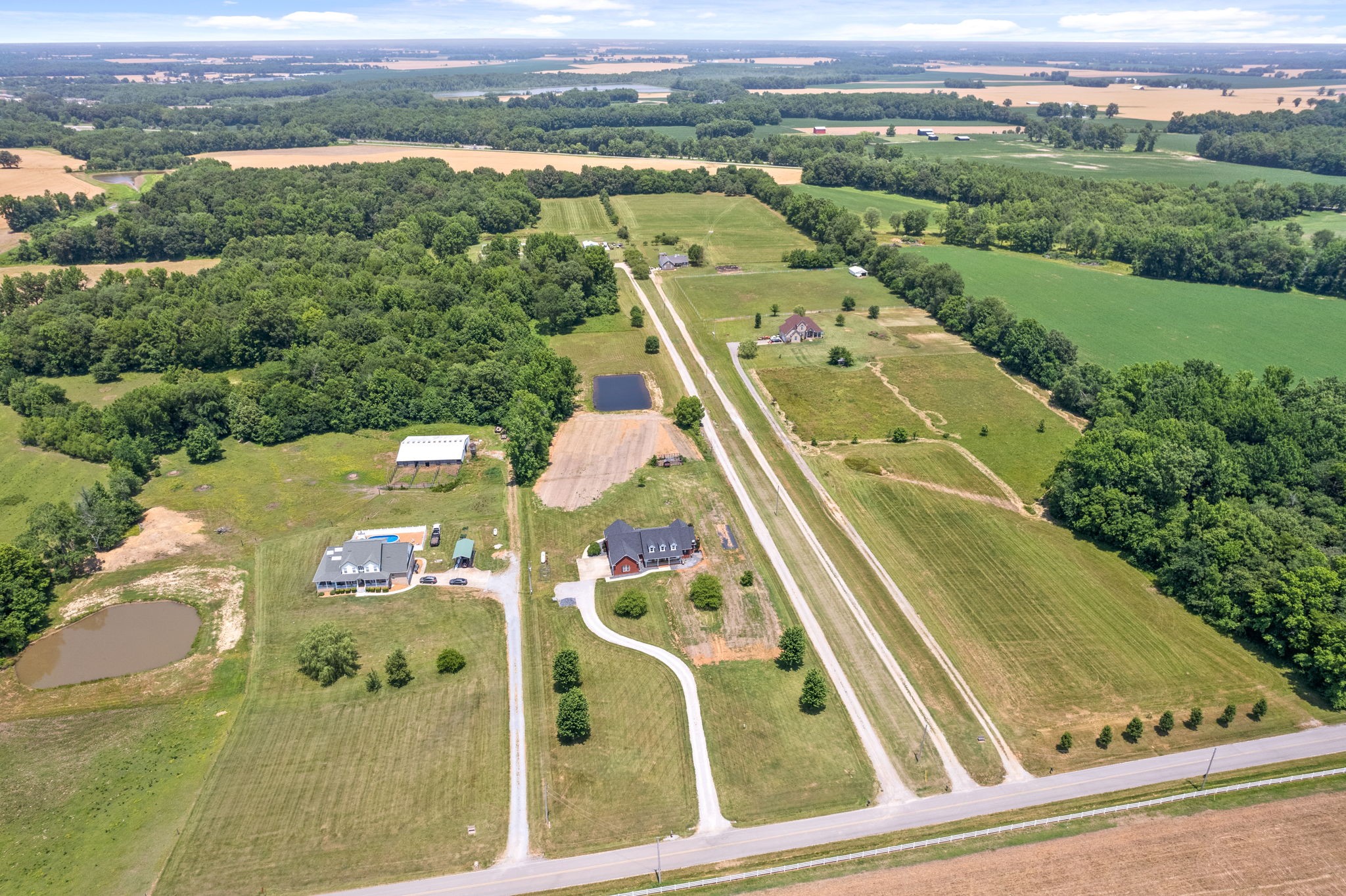 4555 Pineywoods Road Adams, TN 37010 - Photo 45 of 55 an aerial view of a residential houses with outdoor space and city view