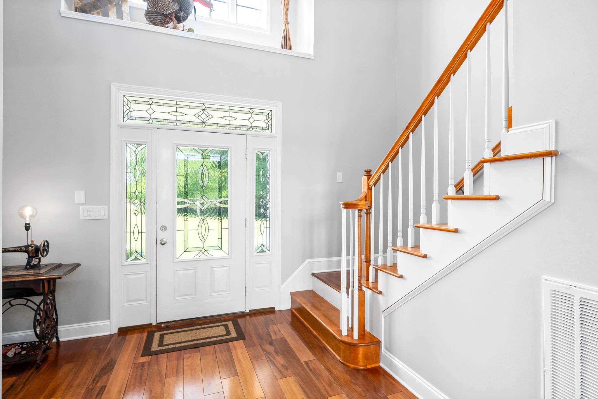 4555 Pineywoods Road Adams, TN 37010 - Photo 6 of 55 a view of an entryway with wooden floor and stairs