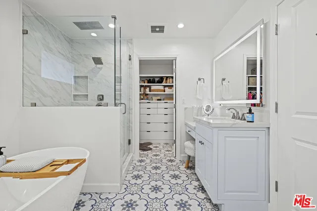 a bathroom with a bathtub sink and toilet